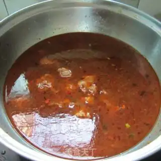 Make Spicy tofu duck soup step 4
