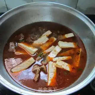 Make Spicy tofu duck soup step 7