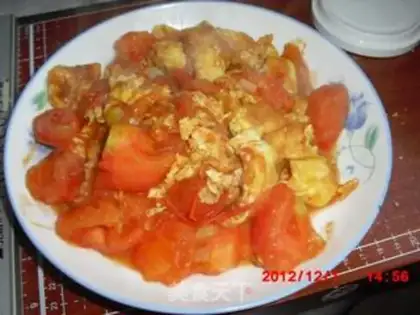 Make Tomato fried eggs step 13