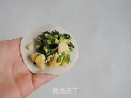 Make Half month egg dumplings step 7