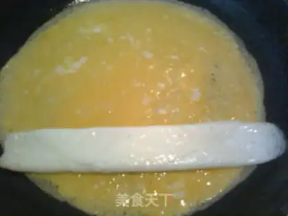 Make Fancy an egg roll step 6