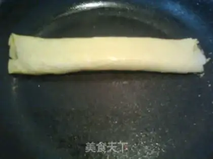 Make Fancy an egg roll step 7