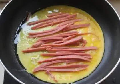 Make Ham cheese egg rolls step 7