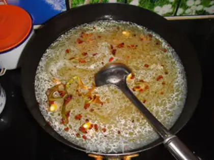 Make Garlic fish fire pot step 5