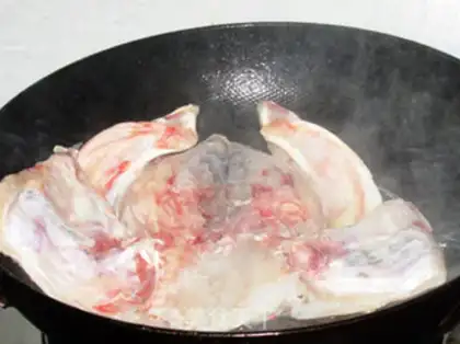 Make Fish-head hotpot step 11