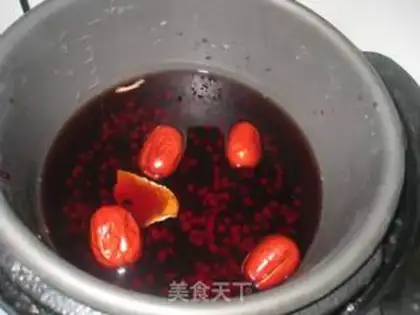 Make Black rice, red bean date congee step 3