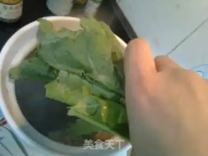 Make Mustard ink pork bone soup step 6