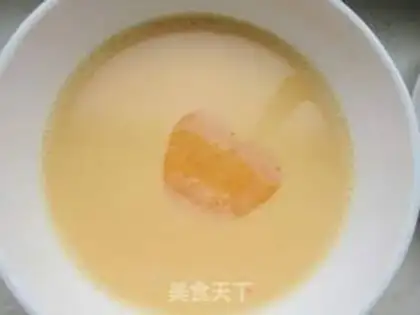 Make Cucumber milk steamed eggs step 7