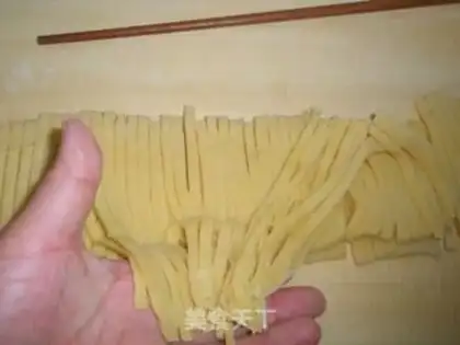 Make Hands on egg noodles step 3