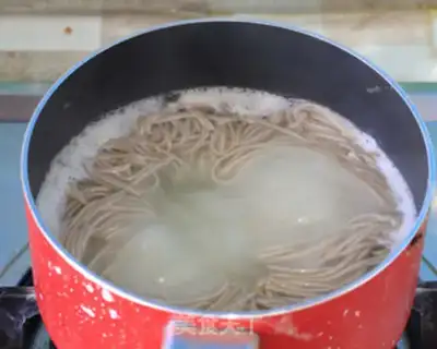 Make Onion shrimp sauce and wheat noodles step 16