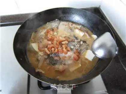 Make Salmon tofu soup step 14