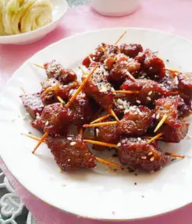 Make Black pepper toothpick beef step 14