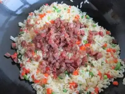 Make Weenie egg fried rice step 7