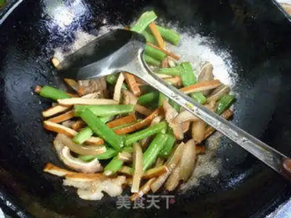 Make Scrambled bean fried pig ears step 11