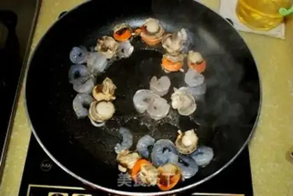 Make Seafood egg fried rice step 8