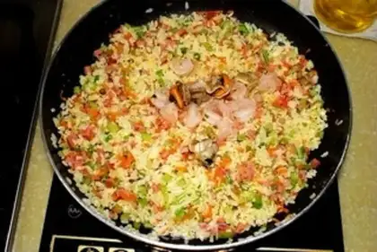 Make Seafood egg fried rice step 12