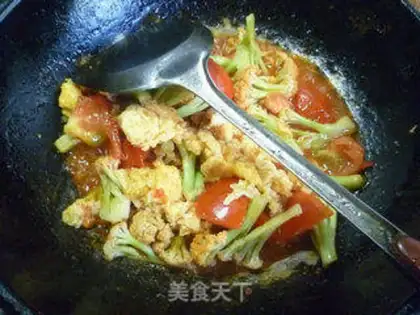 Make Eggs and tomatoes and broccoli step 12