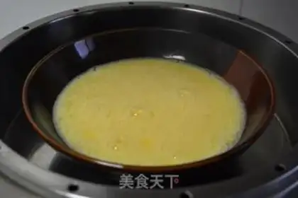 Make Gold rice steamed eggs step 7