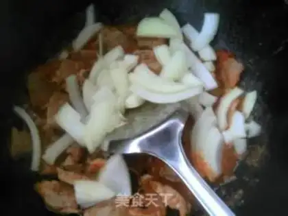 Make Onion tomato beef step 7