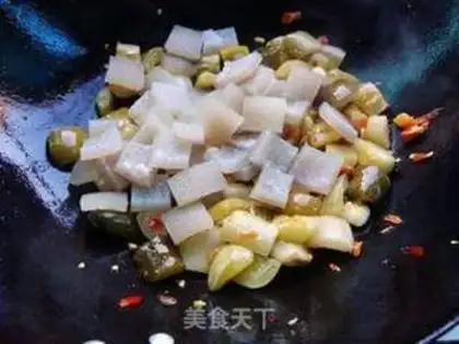 Make Sour cucumber fried pig skin step 6