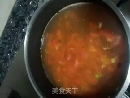 Make Duck egg and tomato soup step 2