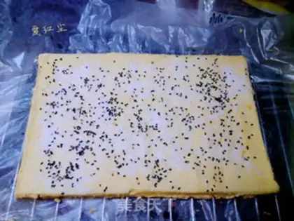 Make Sesame coconut egg rolls step 10