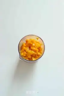 Make Mango and peach popsicles step 1