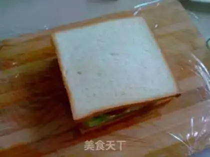 Make Egg ham sandwich step 11