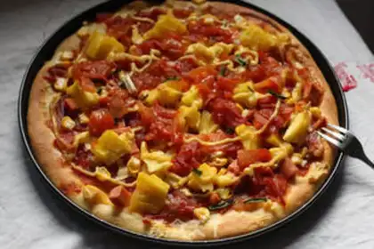 Make Tomato ham pizza step 21