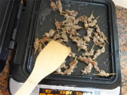 Make Spicy toothpick beef step 6