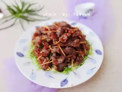 Make Spicy toothpick beef step 8