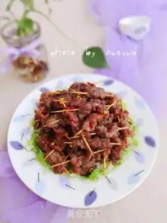 Make Spicy toothpick beef step 10