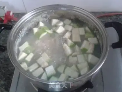 Make Sprinkled egg congee step 3