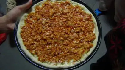 Make Frozen chicken pizza step 11