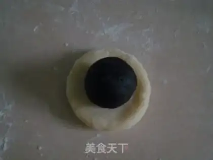 Make Double black sesame sesame mooncake step 7