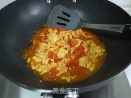 Make Tomato fried eggs step 10