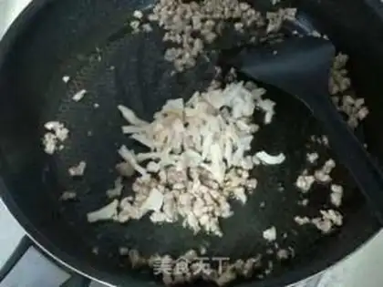 Make Fresh vegetables and abalone congee step 6