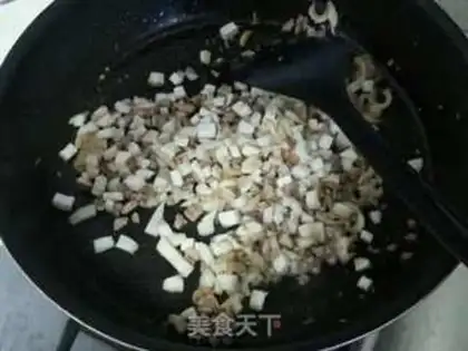 Make Fresh vegetables and abalone congee step 7