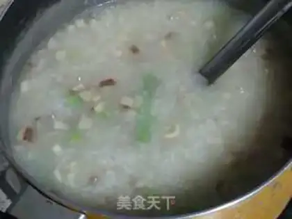 Make Fresh vegetables and abalone congee step 11