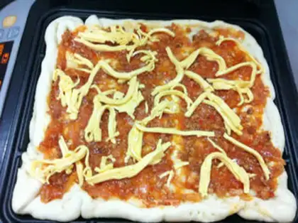 Make Homemade square pizza step 23
