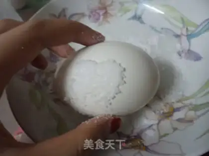 Make A duck egg with red oil step 2
