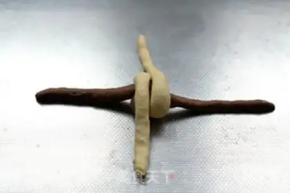 Make Double-coloured braid bread step 11