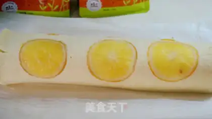 Make Orange cream cake roll step 19