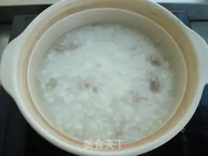 Make Vegetable thin meat congee step 6