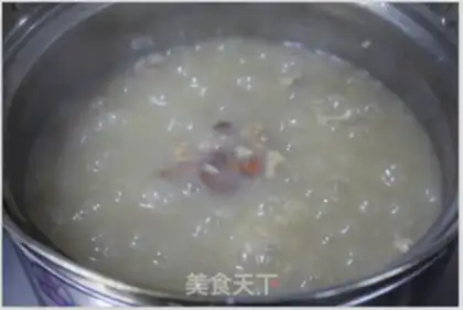 Make Shrimp walnut almond congee step 6