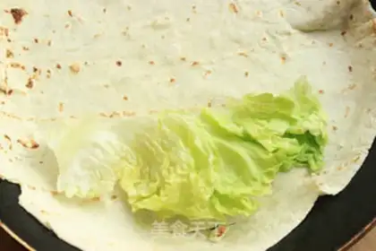 Make Mexican chicken burrito step 13