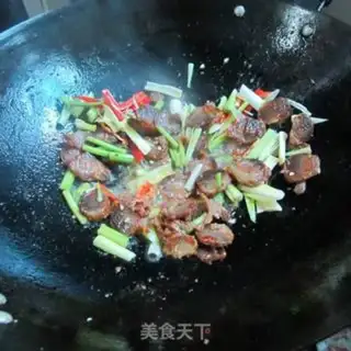 Make Celery garlic fried sausage step 6