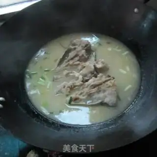 Make Onion fish head soup step 10