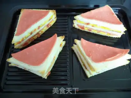 Make Ham tomato egg sandwich step 16