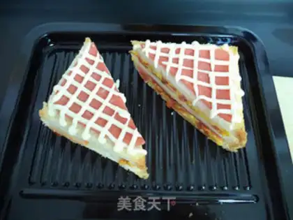 Make Ham tomato egg sandwich step 17